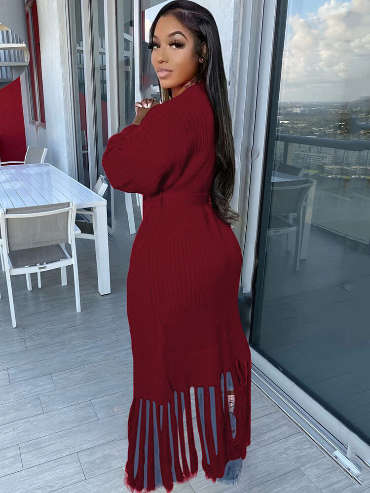 Langärmlige, einfarbige Strickjacke mit Quasten