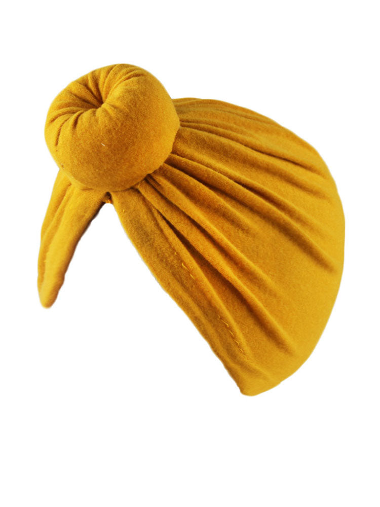 Bonnet turban froncé croisé de couleur unie