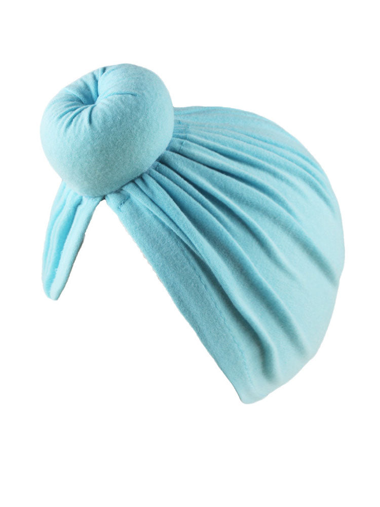 Bonnet turban froncé croisé de couleur unie