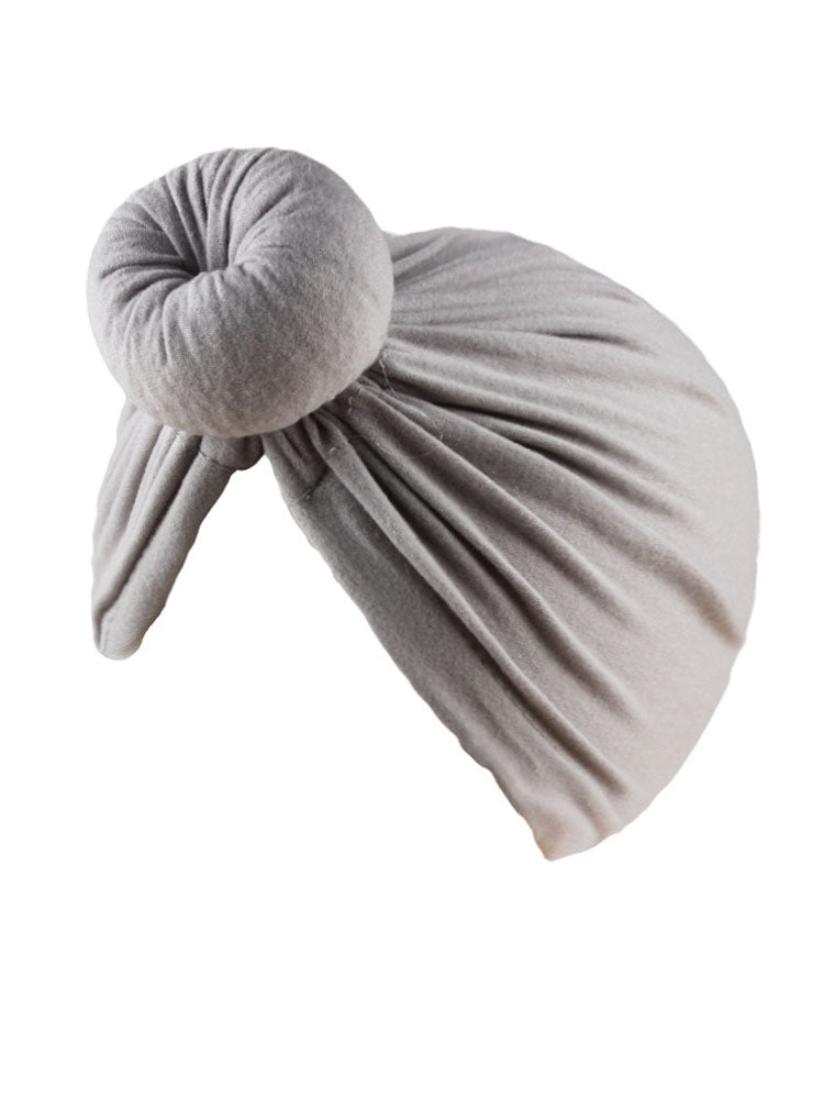 Bonnet turban froncé croisé de couleur unie
